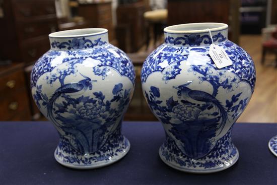 A pair of large Chinese blue and white baluster jars and covers, Kangxi marks, late 19th century, 41.5cm